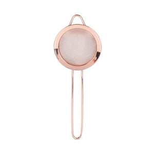 Rose gold coloured whisk